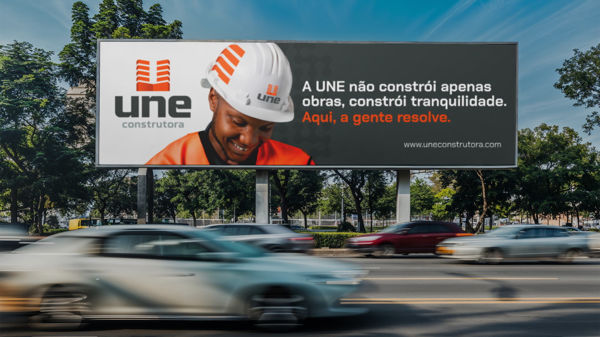 Outdoor Empena Anson Anderson Melo Designer Gráfico Identidade Visual Social Media Logomarca Logo IDV Logotipo Une Construtora Construção civil obras reformas
